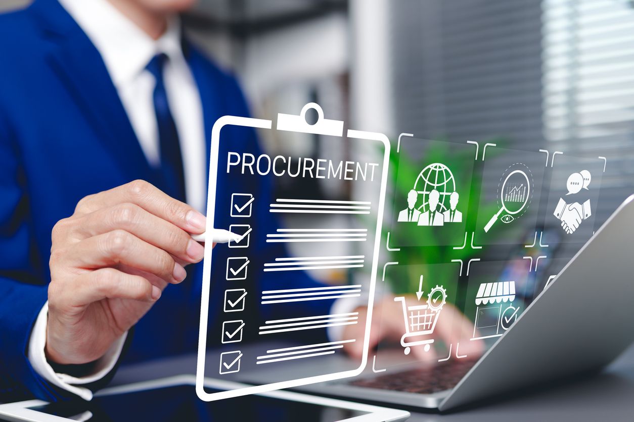 Government contract documents and procurement paperwork on a professional desk