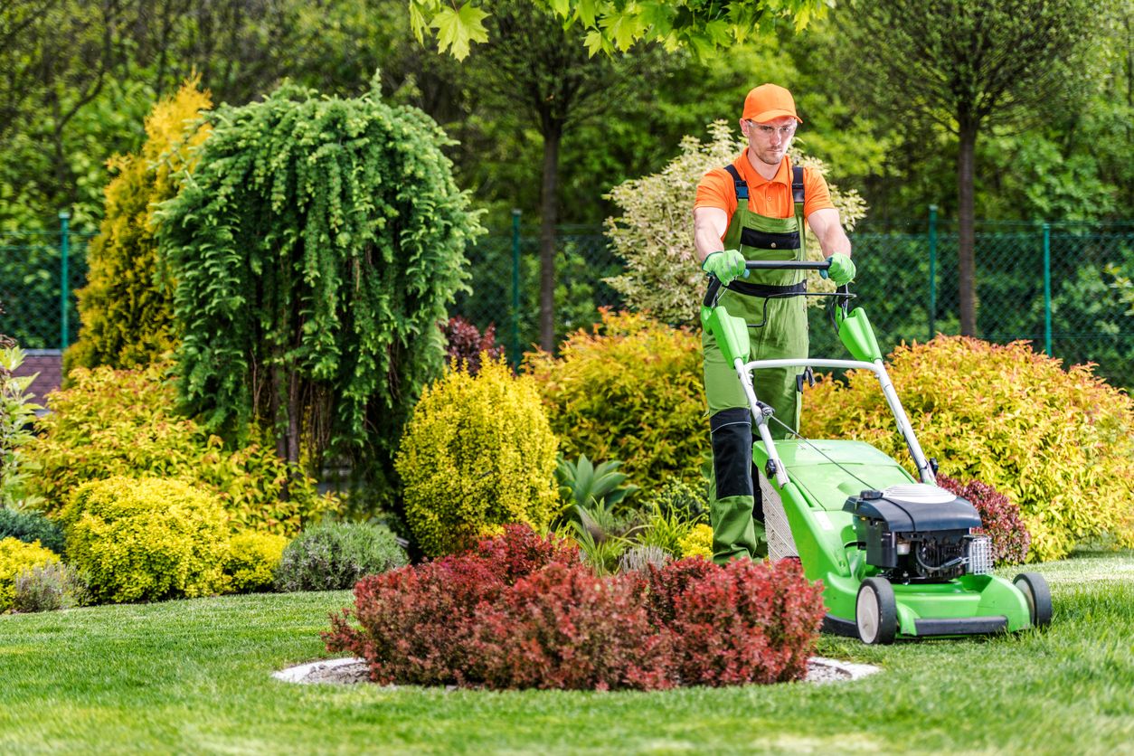 Landscaping crew performing grounds maintenance at a Michigan government property